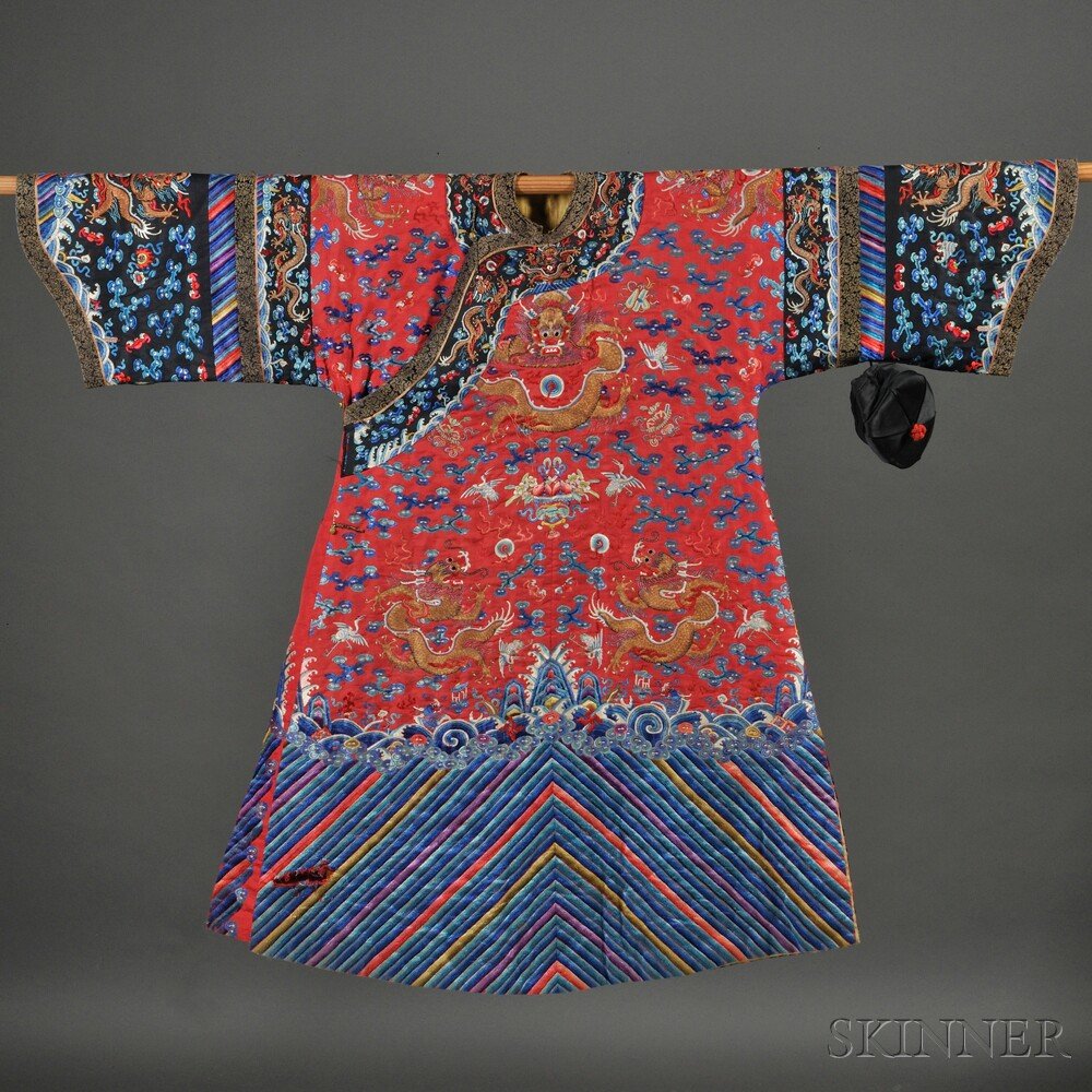 Female Red Dragon Robe, with Hat, China, 20th cent: Female Red Dragon Robe, with Hat, China, 20th century, luxuriously embroidered in satin threads on silk, depicting five-claw dragons along with cranes surrounded by auspicious motifs such as bats, lin