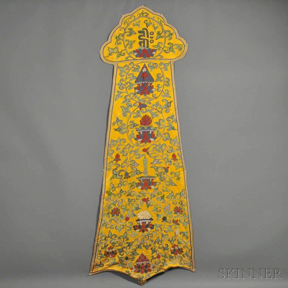 Yellow Silk Wall Hanging, China, 20th century, emb: Yellow Silk Wall Hanging, China, 20th century, embroidered with Buddhist emblems and Sanskrit on each on a lotus throne, amidst scrolling foliage, lg. 84 in.