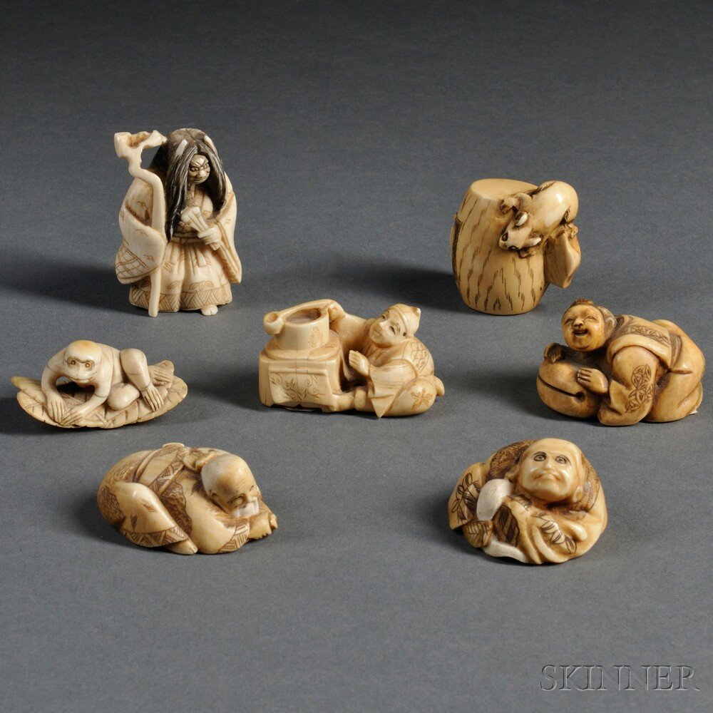 Seven Netsuke, Japan, 20th century, four of figura: Seven Netsuke, Japan, 20th century, four of figural forms, a youkai, a monkey resting on leaves, and a rat with a barrel, five signed on base, lg. to 1 3/4 in.