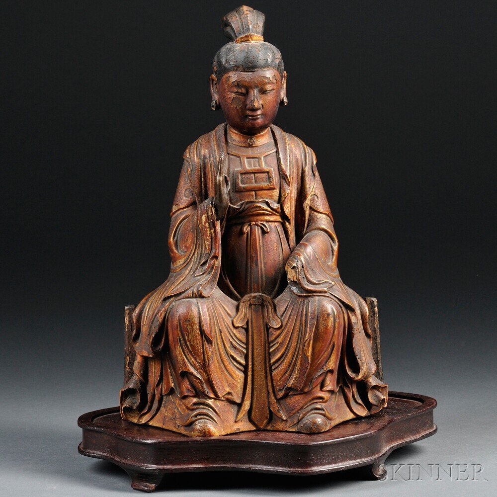Wooden Statue of Bodhisattva, Japan, 18th century,: Wooden Statue of Bodhisattva, Japan, 18th century, a carved Bosatsu sitting on a chair, mounted on a stand, colored in gold, red, and black, ht. 11 1/4 in.