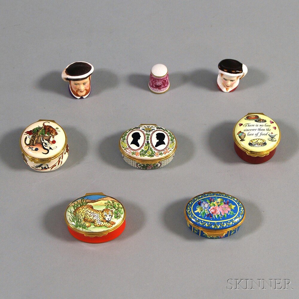 Five Halcyon Days Enameled Trinket Boxes, a Porcelain 1: Five Halcyon Days Enameled Trinket Boxes, a Porcelain 1979 Christmas Thimble, and Two Modern Staffordshire Character Thimbles.