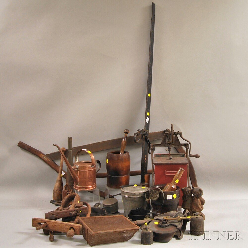 Twenty-seven Assorted Metal and Wood Domestic and Vocat: Twenty-seven Assorted Metal and Wood Domestic and Vocational Items, including two turned wood mortars and pestles, an iron and wood mixing box, a bow saw, a painted Fairbanks steelyard, a copper water