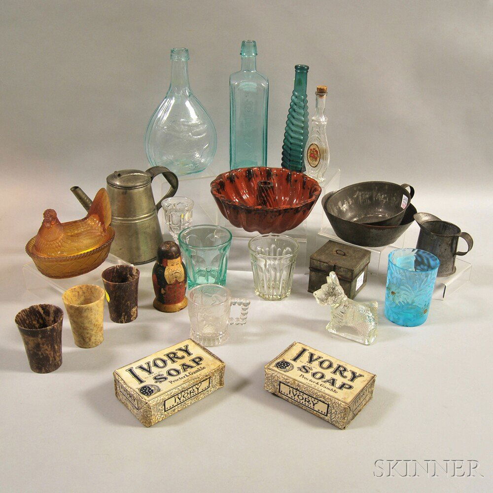 Twenty-three Assorted Americana and Collectible Article: Twenty-three Assorted Americana and Collectible Articles, including a glazed redware culinary mold, two Ivory soap bar packages, four pieces of tinware, eight assorted glass items, three stone beakers