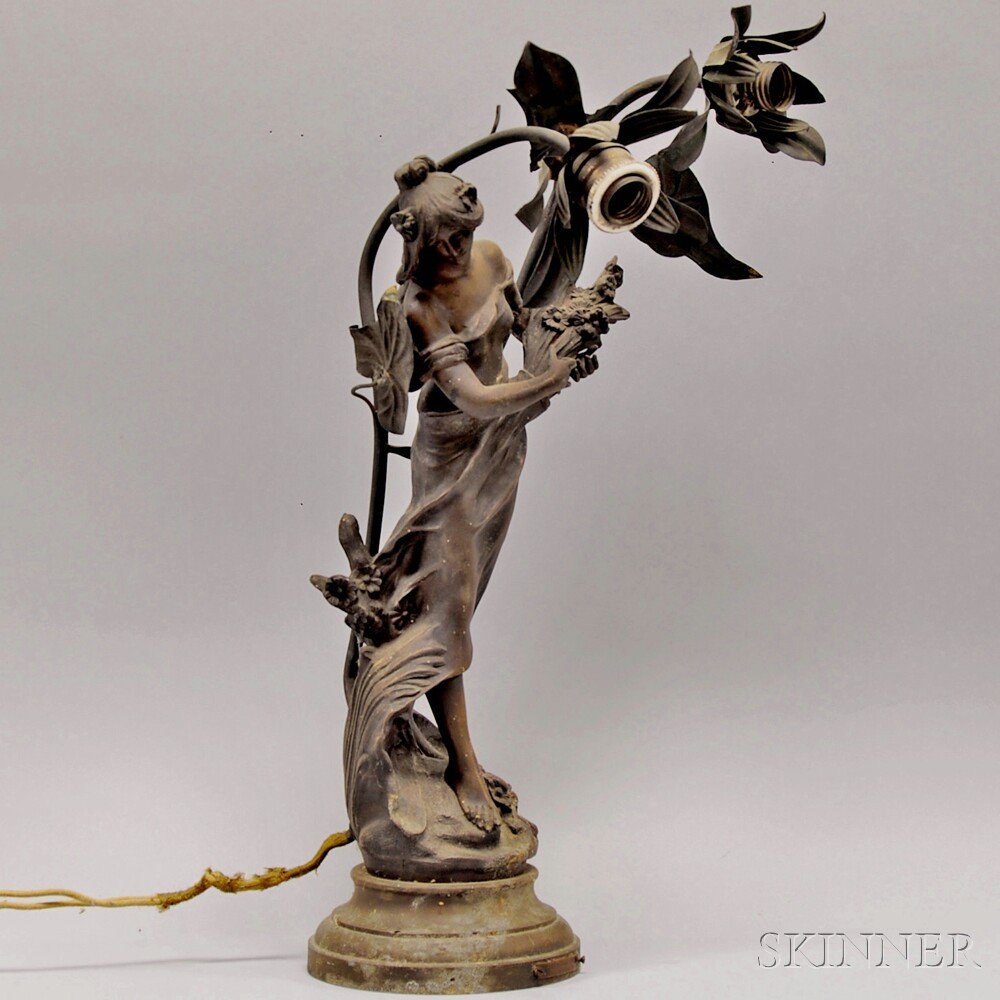 Art Nouveau Patinated Cast Metal Figural Reine de Pres: Art Nouveau Patinated Cast Metal Figural Reine de Pres Table Lamp, after A. Moreau, with two lights, ht. 20 3/4 in.