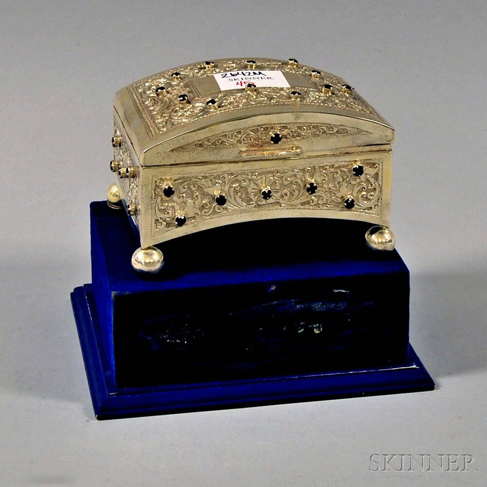 Paste-set, Velvet-lined Silver Keepsake Box, lacking vi: Paste-set, Velvet-lined Silver Keepsake Box, lacking visible marks, the dome-topped box set with a number of garnet-colored pastes in a scrolling foliate design, raised on four bun feet, lined in roya