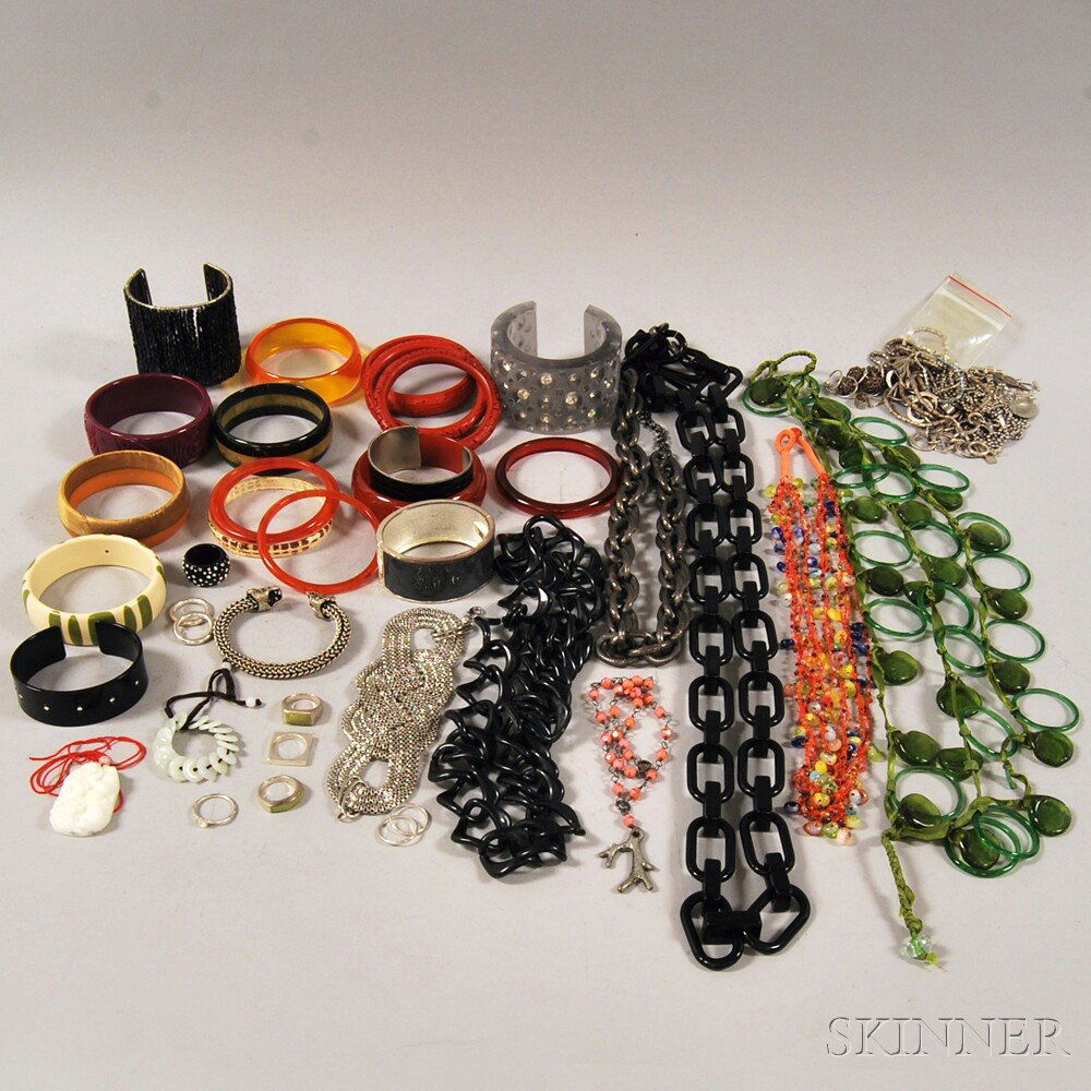 Group of Costume Jewelry, including carved and plastic: Group of Costume Jewelry, including carved and plastic bangles, an oversized beaded cuff, three cinnabar bangles, three plastic and metal chain necklaces, a white metal mesh bracelet, sterling silver