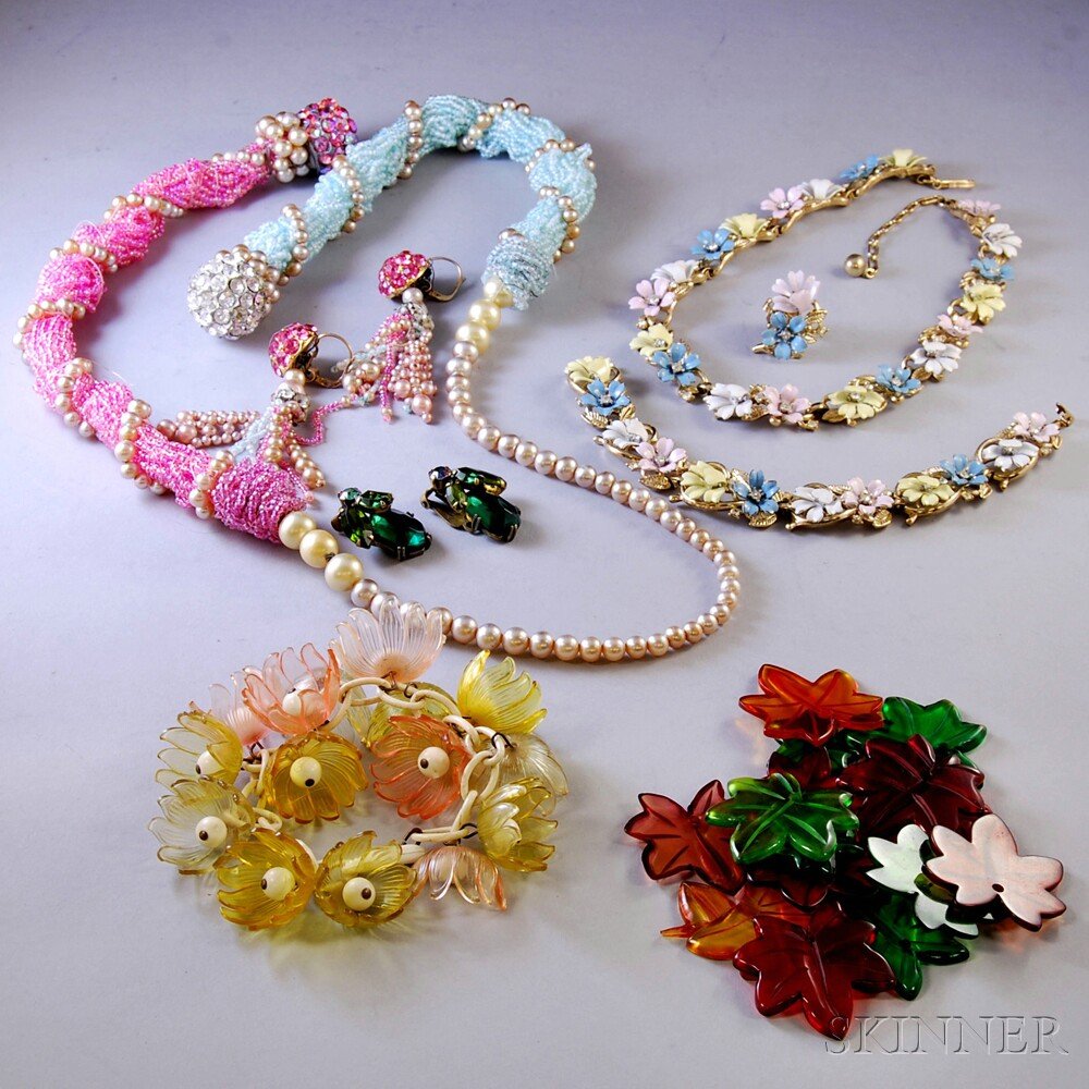 Small Group of Costume Jewelry, including plastic leaf: Small Group of Costume Jewelry, including plastic leaf elements, a pair of Weiss green paste earclips, a Trifari enameled floral necklace, bracelet, and single earring, a plastic floral bracelet, and
