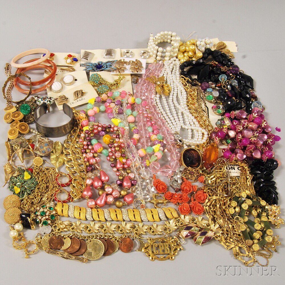 Group of Costume Jewelry, including gold-tone and gold-: Group of Costume Jewelry, including gold-tone and gold-filled pieces, a faux coral suite, brooches, a coin charm bracelet, earrings, a Hattie Carnegie bracelet, beaded necklaces, and other items, some