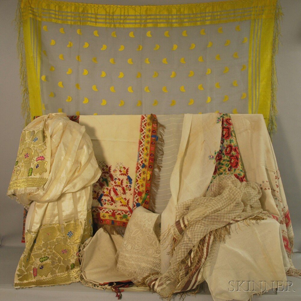 Eleven Continental Textiles, eastern Europe, southeaste: Eleven Continental Textiles, eastern Europe, southeastern Europe, and the Middle East, 19th/20th century, including a Romanian sheer silk headdress, Croatian embroidered scarf and kerchief, a Slovak l