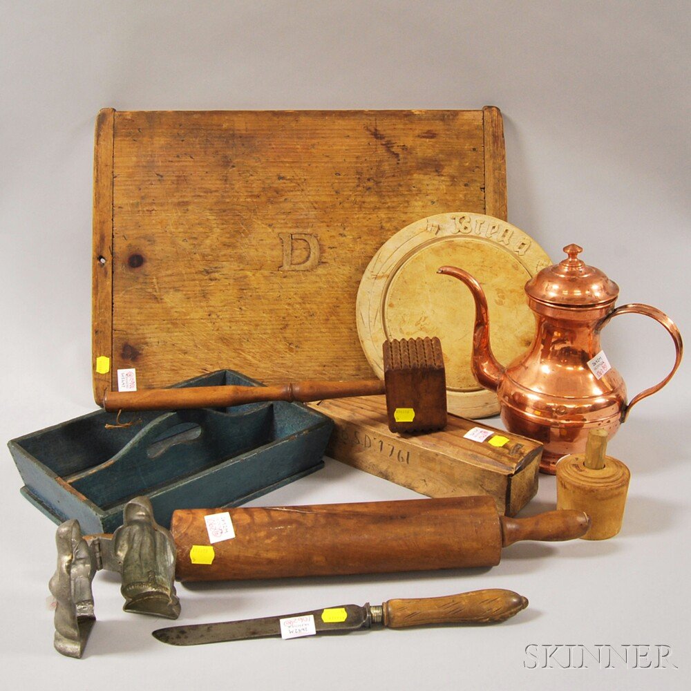 Ten Assorted Mostly Wooden Country Kitchen Items, a rol: Ten Assorted Mostly Wooden Country Kitchen Items, a rolling pin, butter stamp, mallet, breadboard, pewter Santa figural ice cream mold, a blue-painted cutlery tray, hewn slide-lid box, a bread knife a