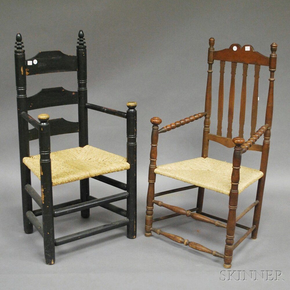 Black-painted Pilgrim Century-style Turned Maple Slat-b: Black-painted Pilgrim Century-style Turned Maple Slat-back Armchair and a Bannister-back and Turned Maple Armchair with Rush Seat, the black-painted chair possibly Wallace Nutting.