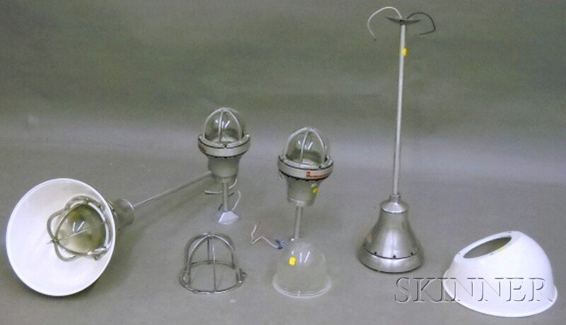 Two Pairs of Industrial Lights, a pair of cast metal pe: Two Pairs of Industrial Lights, a pair of cast metal pendant ceiling lights and a pair of metal hanging ceiling lamps, lg. 16, 40 in., respectively.