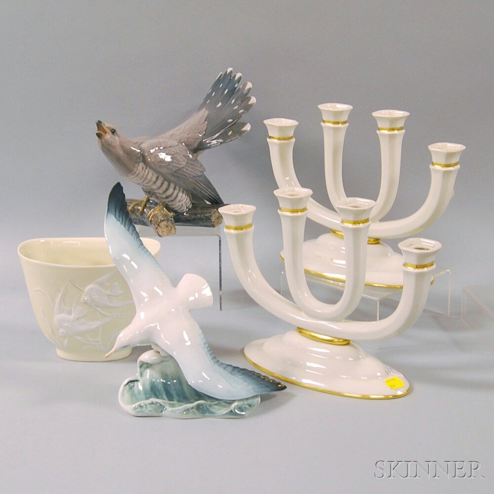 Four Pieces Rosenthal Porcelain and a Bing & Grondahl P: Four Pieces Rosenthal Porcelain and a Bing & Grondahl Porcelain Bird Figurine, Rosenthal pieces including a pair of four-light candleholders, seagull and cresting wave figurine, and an elliptical gold