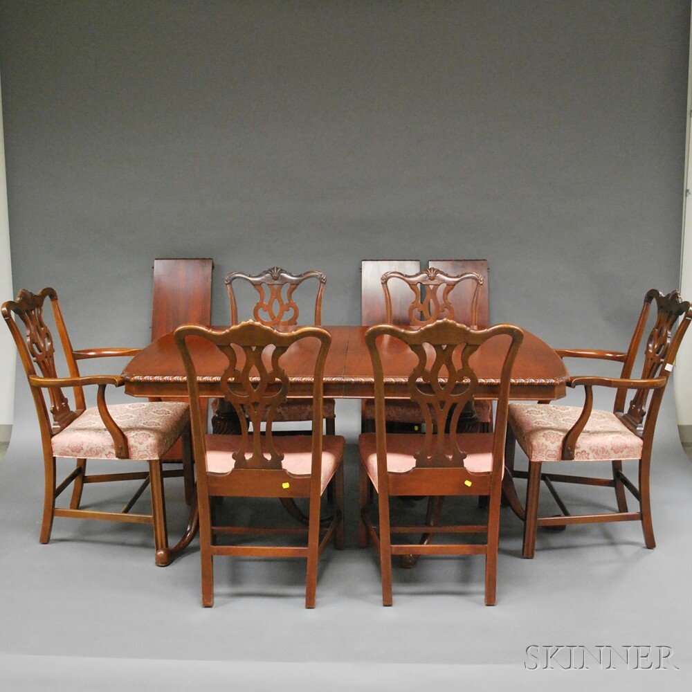 Eight-piece Carved Mahogany Chippendale-style Dining Ro: Eight-piece Carved Mahogany Chippendale-style Dining Room Set, comprised of six upholstered chairs, four side chairs and two armchairs, a buffet sideboard, and a double tripod-pedestal table with thre