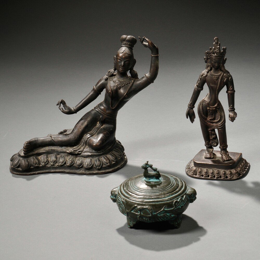 Three Metal Items, Asia, an Indian figurine of a: Three Metal Items, Asia, an Indian figurine of a dancing woman on a lotus base, an Indian male figure, and a green-painted covered tripod censer decorated with squirrels and grapevines, ht. to 7 1/2 i
