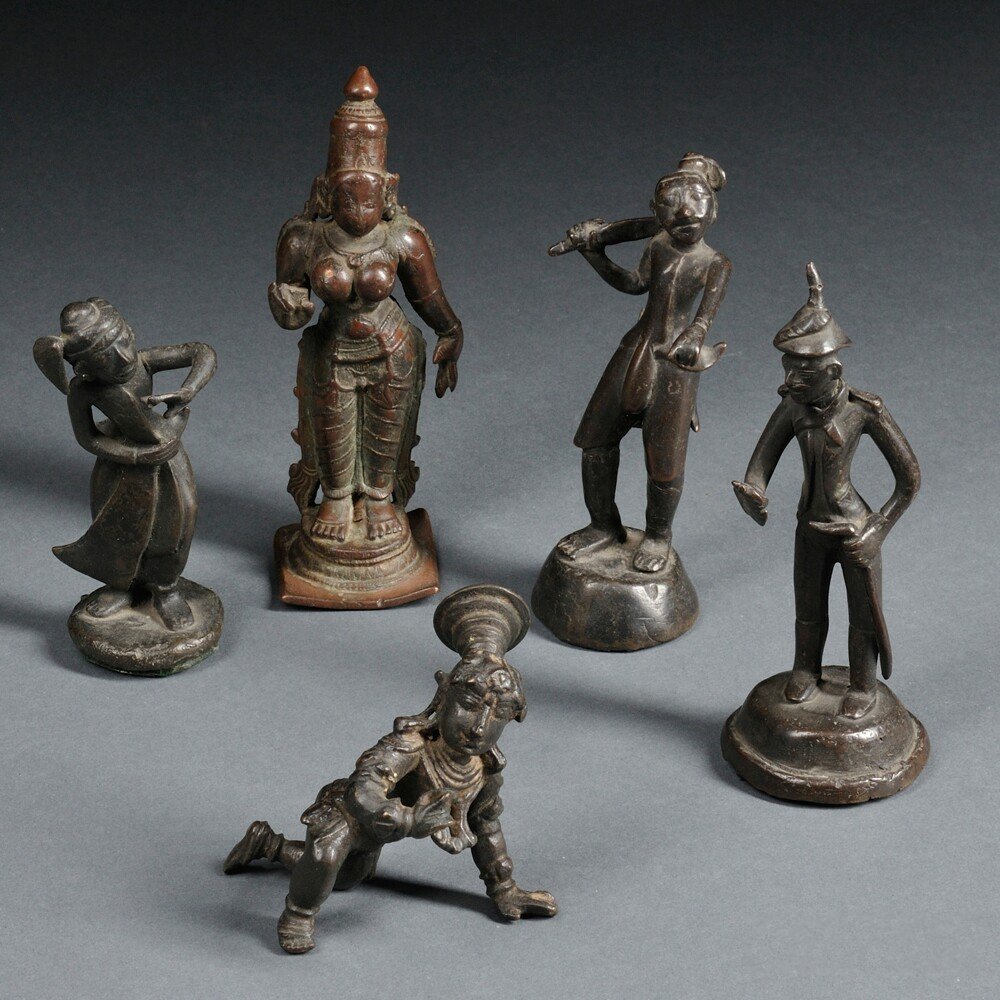 Five Metal Figures, Nepal and India, a standing figure: Five Metal Figures, Nepal and India, a standing figure of the goddess Devi, and four male figures, ht. to 6 in.