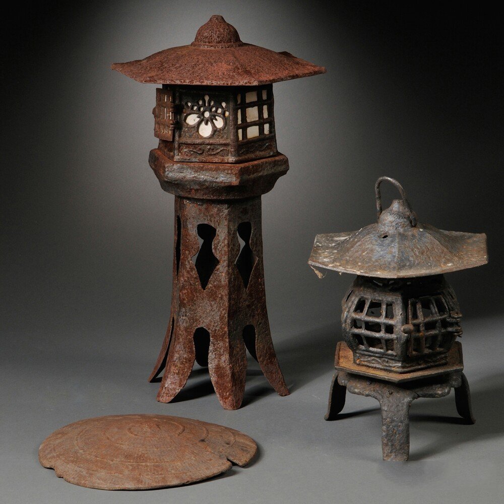 Two Iron Lanterns and a Lantern Roof, Japan, a hanging: Two Iron Lanterns and a Lantern Roof, Japan, a hanging lantern of pavilion shape, resting on a tripod foot, a hexagonal pavilion-shape lantern with screened windows and stemmed foot with pierced desig