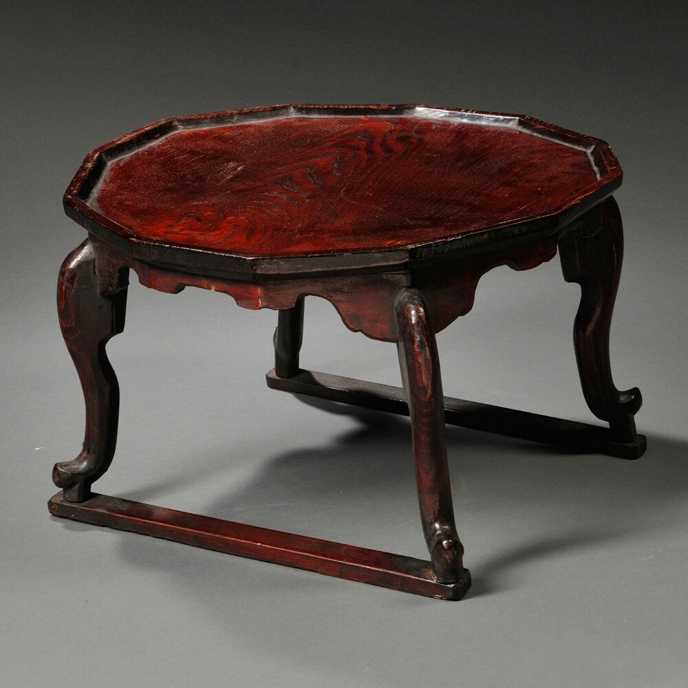 Tray Table, Hojokban, Korea, 19th/20th century, with a: Tray Table, Hojokban, Korea, 19th/20th century, with a twelve-sided top above shaped aprons, lightly lacquered, with distinctive grain and reddish-brown patina, ht. 10 3/4, dia. 16 in.
