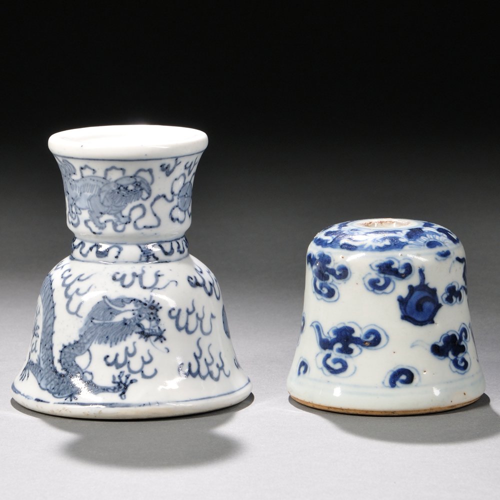 Blue and White Incense Holder and Scroll Weight, China,: Blue and White Incense Holder and Scroll Weight, China, Ming Dynasty or later, hourglass-shaped incense holder with a hollowed base and a central opening, the lower register depicting a dragon chasing