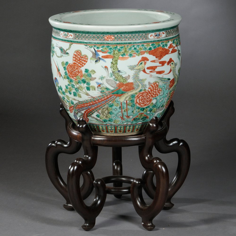 Famille Verte Jardiniere and Stand, China, 19th/20th: Famille Verte Jardiniere and Stand, China, 19th/20th century, decorated with phoenixes, cranes, ducks, lotus plants, pine, and other auspicious motifs, wood stand, dia. 18 3/4 in.