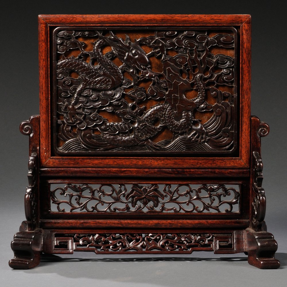Carved Wood Table Screen with Dragons, China, 20th: Carved Wood Table Screen with Dragons, China, 20th century, with two-tiered frame decorated with openwork lotus scrolls to the top and foliate scrolls between two square swirls to the bottom, an openw