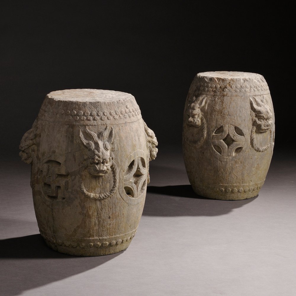Pair of Drum-shaped Garden Stools, China, 18th/19th: Pair of Drum-shaped Garden Stools, China, 18th/19th century, granite, drums decorated with four dragon's heads and wan symbols, top and bottom are rows of ornamental "tacks," ht. 19 1/2, dia. 15 in.