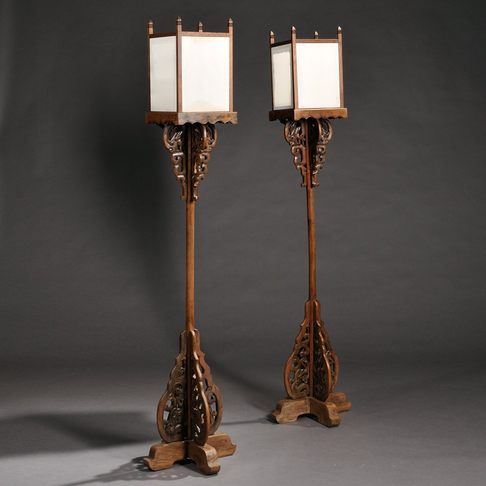 Pair of Lamp Stands, China, yumu, candle stand set: Pair of Lamp Stands, China, yumu, candle stand set above four openwork spandrels with dragon motifs attached to an upright pole, two crossed shoe feet topped by conforming dragon motif spandrels, silk