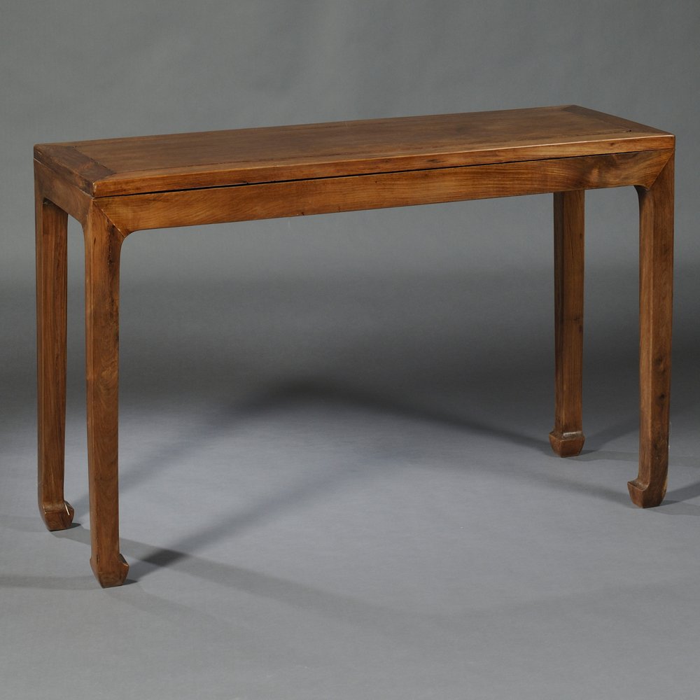 Corner Leg Table, China, 20th century, hardwood,: Corner Leg Table, China, 20th century, hardwood, single-board top set in squared frame, squared legs ending in inverted hoof feet, lg. 52 1/4, wd. 19, ht. 34 in.