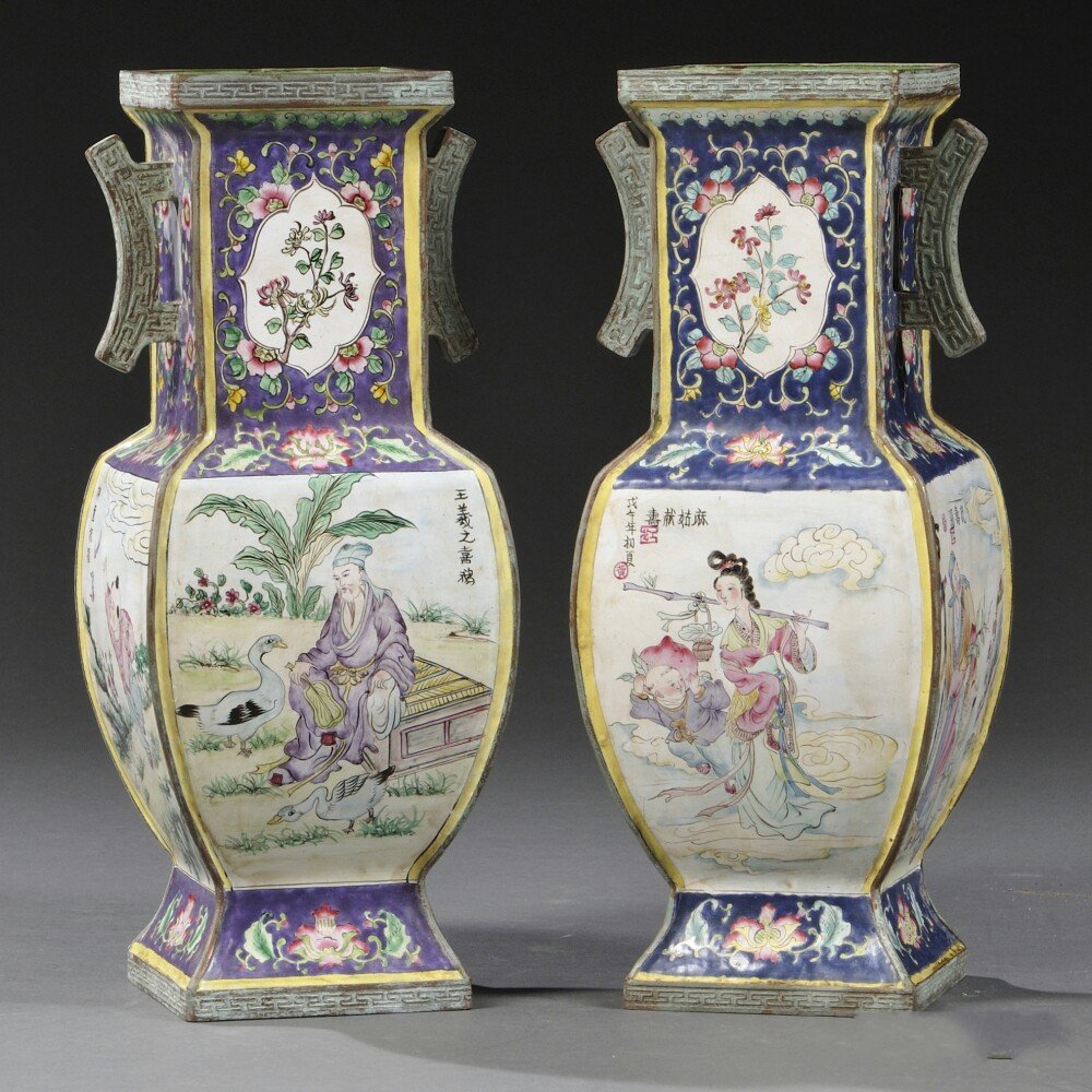 Pair of Enameled Metal Vases, China, late 19th century,: Pair of Enameled Metal Vases, China, late 19th century, of square baluster form with handles at the neck, the side panels depicting scenes of several of the Eight Daoist Immortals, Shou Lao, Wang Xizh