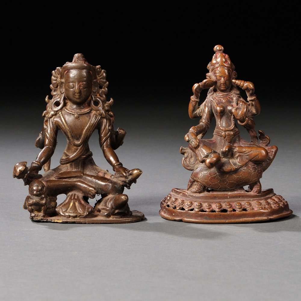 Two Bronze Figures of Bodhisattva, Nepal, a four-armed: Two Bronze Figures of Bodhisattva, Nepal, a four-armed figure seated on a turtle on top of a lotus pedestal; and a four-armed figure seated with a turtle under his left knee and a disciple in front of