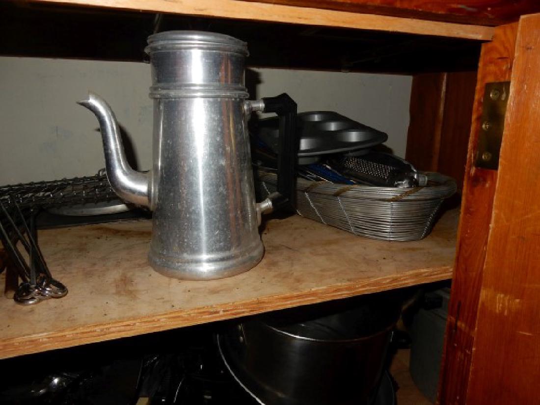 Household: 2 shelves of kitchen items:old alumium coffee pot, utensils, cupcake pans, graters, pans, pots