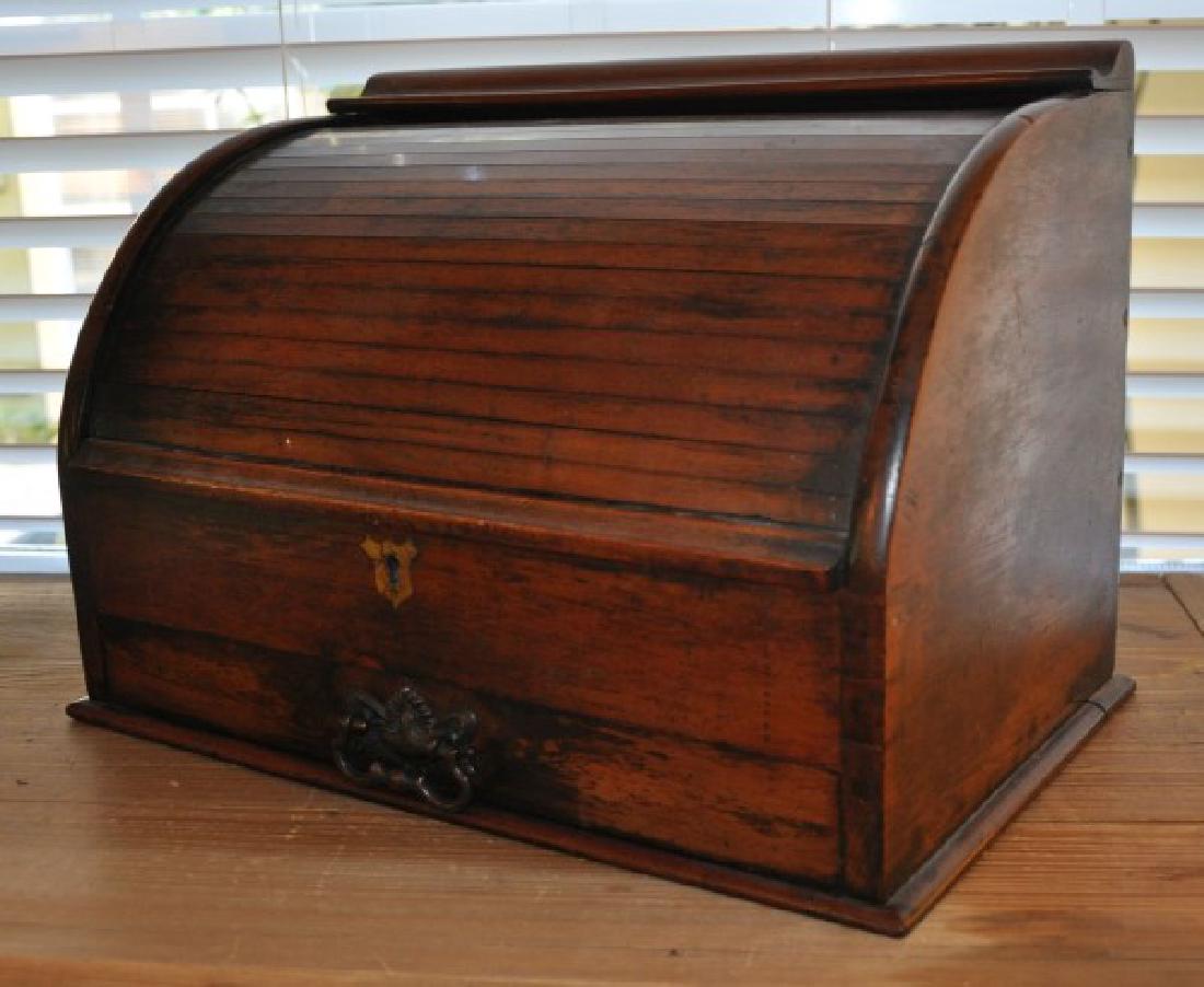 Furniture: Small roll top desk with 2 ink wells, 1 drawer 10" h. x 14" w. x 9" d., 19th century