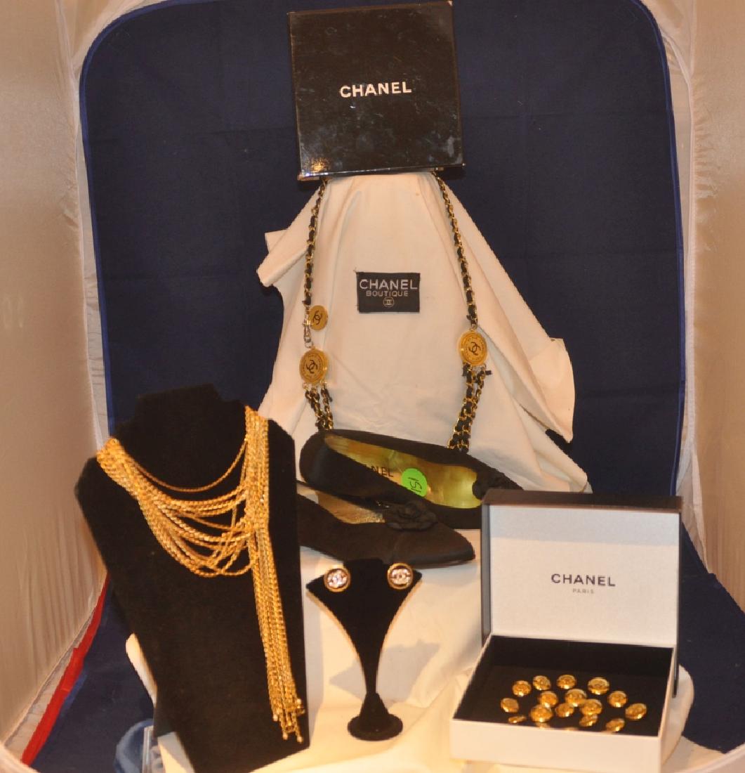 Designer Clothing: Chanel shoes, belt, necklace, buttons, earring:s black flats size 39 1/2, never worn, pair of button earings, belt with leather & gold metal, gold tone necklace, 18 buttons, 2 original Chanel boxes, 2