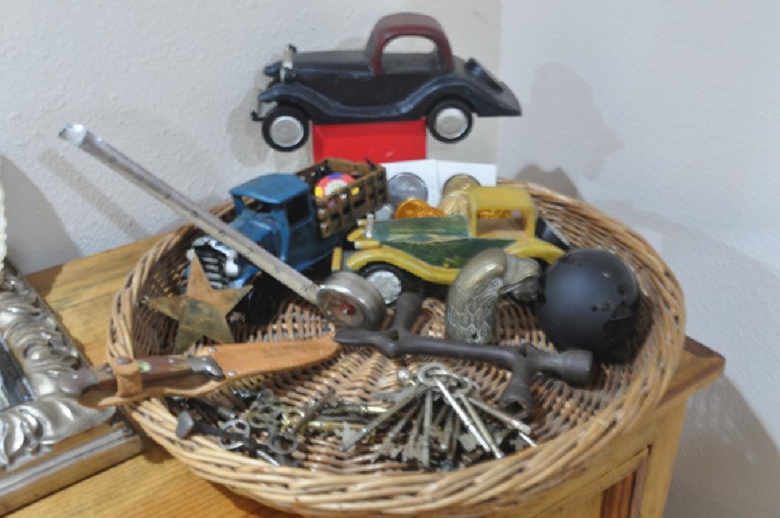 Collectibles: Old knife with compass by Goselight Village, Antique multi-tool, old stainless measuring tape, 3 repo cars, old nail with heart top, globe paper weight, Mardi Gras doubloons, many old keys, 19th/20th 