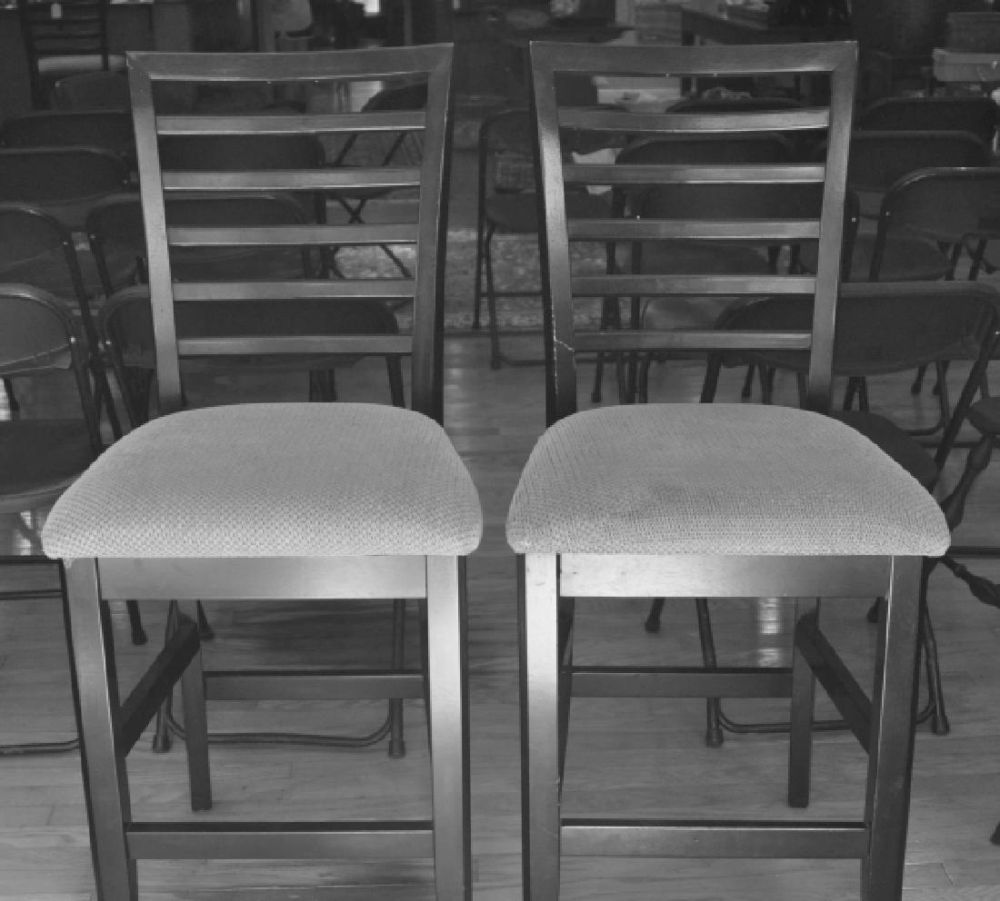 Furniture: 4 counter top bar stools: wood with upholstered seats, seat to floor 26" h, to the top of the chair 44" h, 21st century