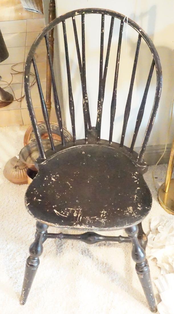 Furniture: Small Windsor chair with original black paint, carved legs, 1'4: w x 1'7" d x 2'11" h, early 19th century