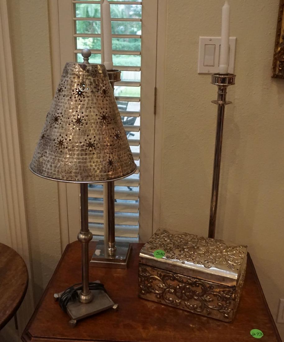 Silver Plate: Silver plate decorative box 1' w x 7" d x 6" h, lamp with cut out metal shade 2'3" h, pair of tall candle sticks by Bombay Co. 2" h, 20th century