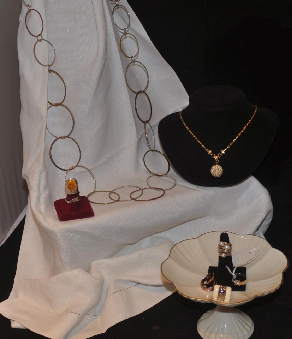 Sterling Jewelry: Lenox porcelain compote with jewelry, some sterling: sterling tri-color ring, KLM studios sterling necklace, long chain necklace, sterling & amber ring, stainless ring, sterling ring, 2.63 troy ounces