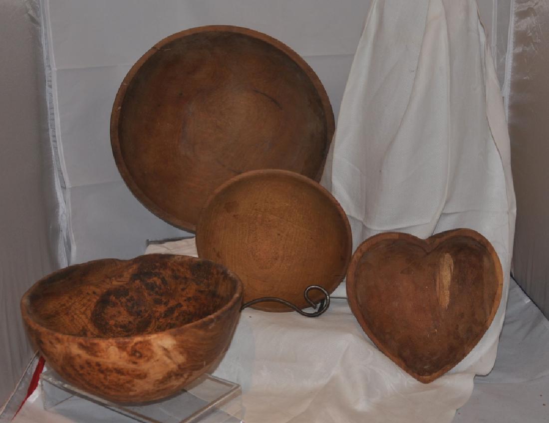 Primitive Collectibles: 4 antique wood bowls: 12" , 10", 7 1/2" round, heart 8" d, 19th century
