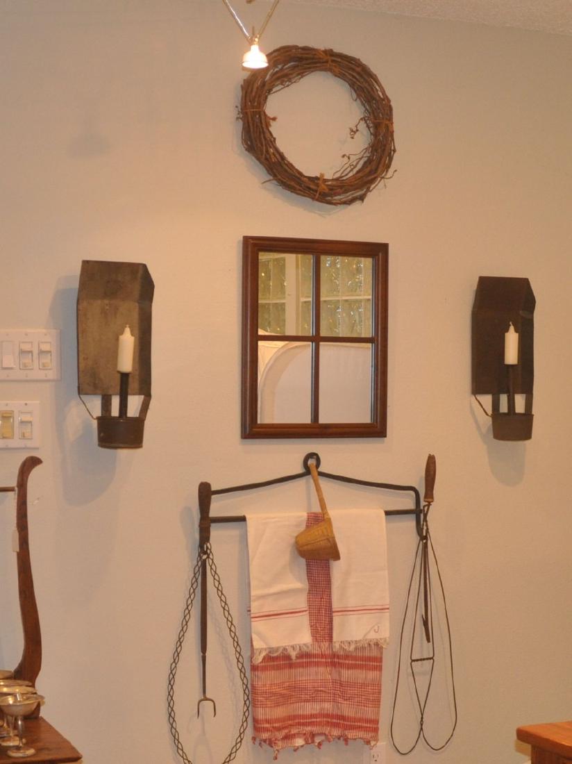 Primitive Collectibles: Primitive tools, tin sconces, window mirror, vintage kitchen linens: 2 iron rug beaters, primitive iron rack with hooks 1'11" w, 2 iron tools, tin wall sconces 1'5" h, 19th century
