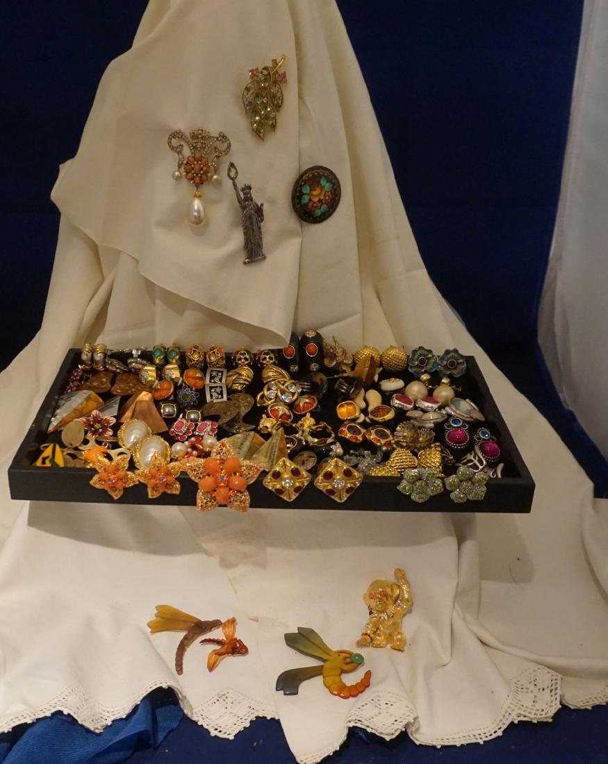 Costume Jewelry: 30+ clip earrings & 7 broaches: silver & gold tone, rhinestones, pearls, stones, Made by Nolan Miller, Joan Rivers, JJ 1986, CheDior, 20th century