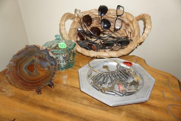 Foreign Money & Skeleton Keys: Assortment of sun & reading glasses, jar of American & foreign money, pewter tray with old keys, cross section of stone