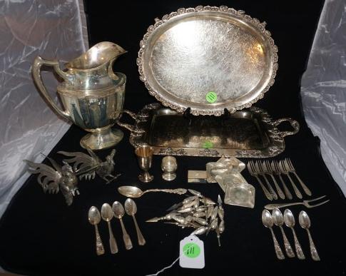 Sterling & Silver Plate Items: Sterling & silver plate: 18 sterling corn holders, sterling match cover, 4 sterling ash trays, sterling cordial (weighed), 2.12 troy ounces, silver plate-8 demi-tasse & 1 teaspoons, cordial, oval tray