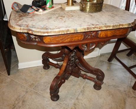 Marble Top Furniture, Red Gum Plantation: Renaissance revival parlor table, ornate pedestal base, bun feet on casters, beveled marble top 38" l x 26" d x 30" h, from the Red Gum Plantation in Hughes, Arkansas, late 19th century
