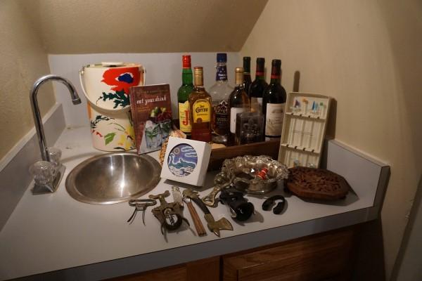 Bar Items: Bar items: ice bucket, wine coasters, unusual bottles & wine openers stirrers, wood tray (Local pick-up only)