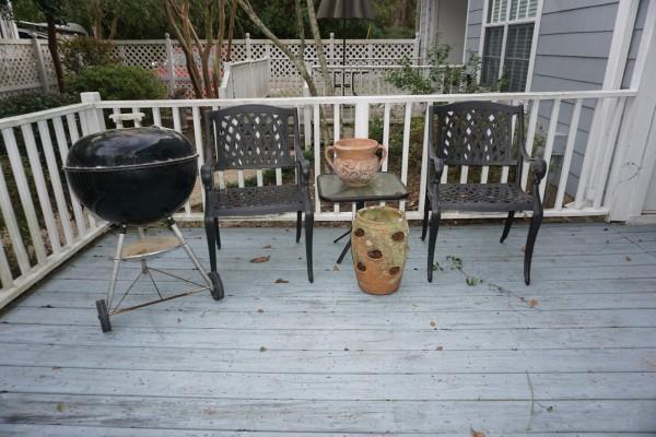 Garden: Garden items: Webber grill, strawberry pot, clay pot, small glass & iron side table, pair of cast aluminum garden chairs