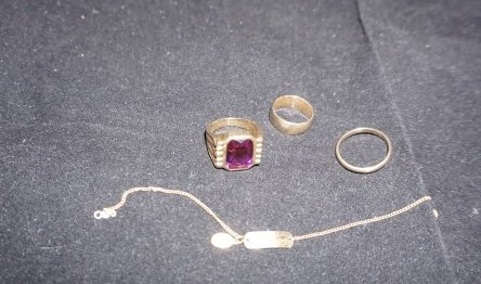 10 K & 14 K gold jewelry: 10 K gold men's ring with stone, 10 K gold baby's bracelet, 14 K gold ladies wide gold wedding ban, 14 K gold men's thin gold wedding ban