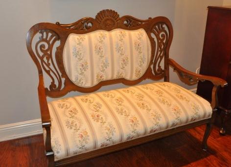 Mahogany settee: Mahogany settee, carved back & arms, upholstered back & seat 47" l x 22" d x 39" h , 20th century