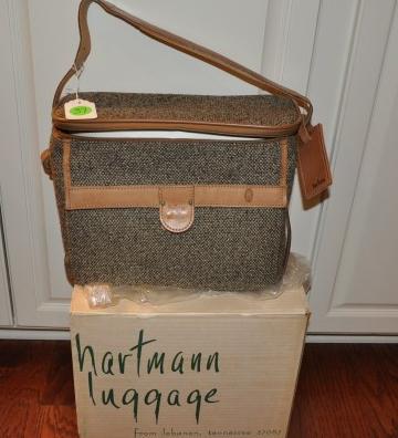 Vintage Hartmann Luggage in original box: Vintage Hartmann Luggage in original box, genuine leather, walnut , small shoulder tote 14" l x 11 1/2"h