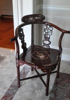 Asian rosewood corner chair: Asian rosewood corner chair with inlay of mother-of-pearl 28" l x 22" d x33" h, 20th century